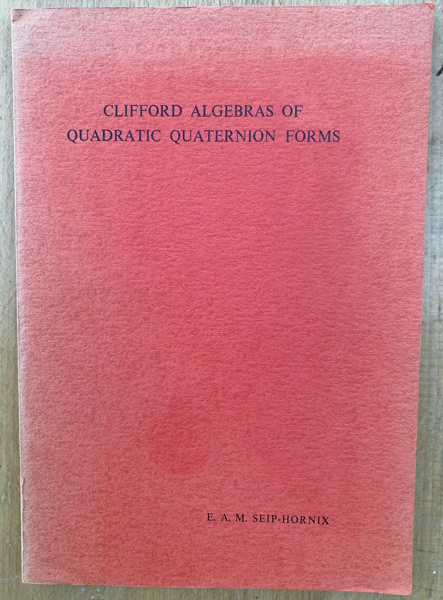 Clifford Algebras Of Quadratic Quaternion Forms