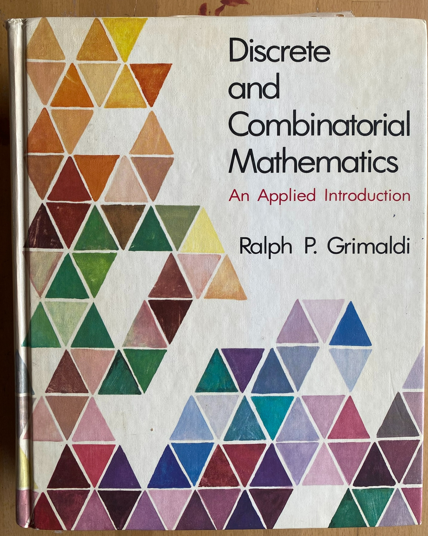 Discrete and Combinatorial Mathematics - An Applied Introduction