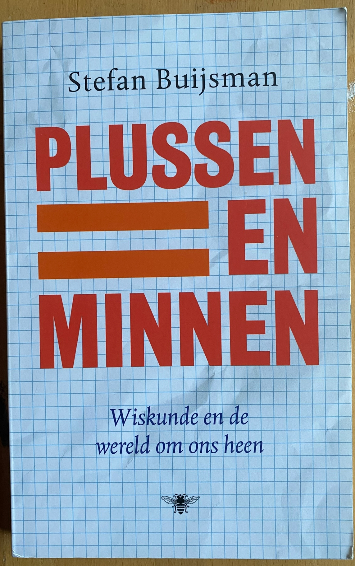 Plussen en minnen - Wiskunde en de Wereld om ons heen
